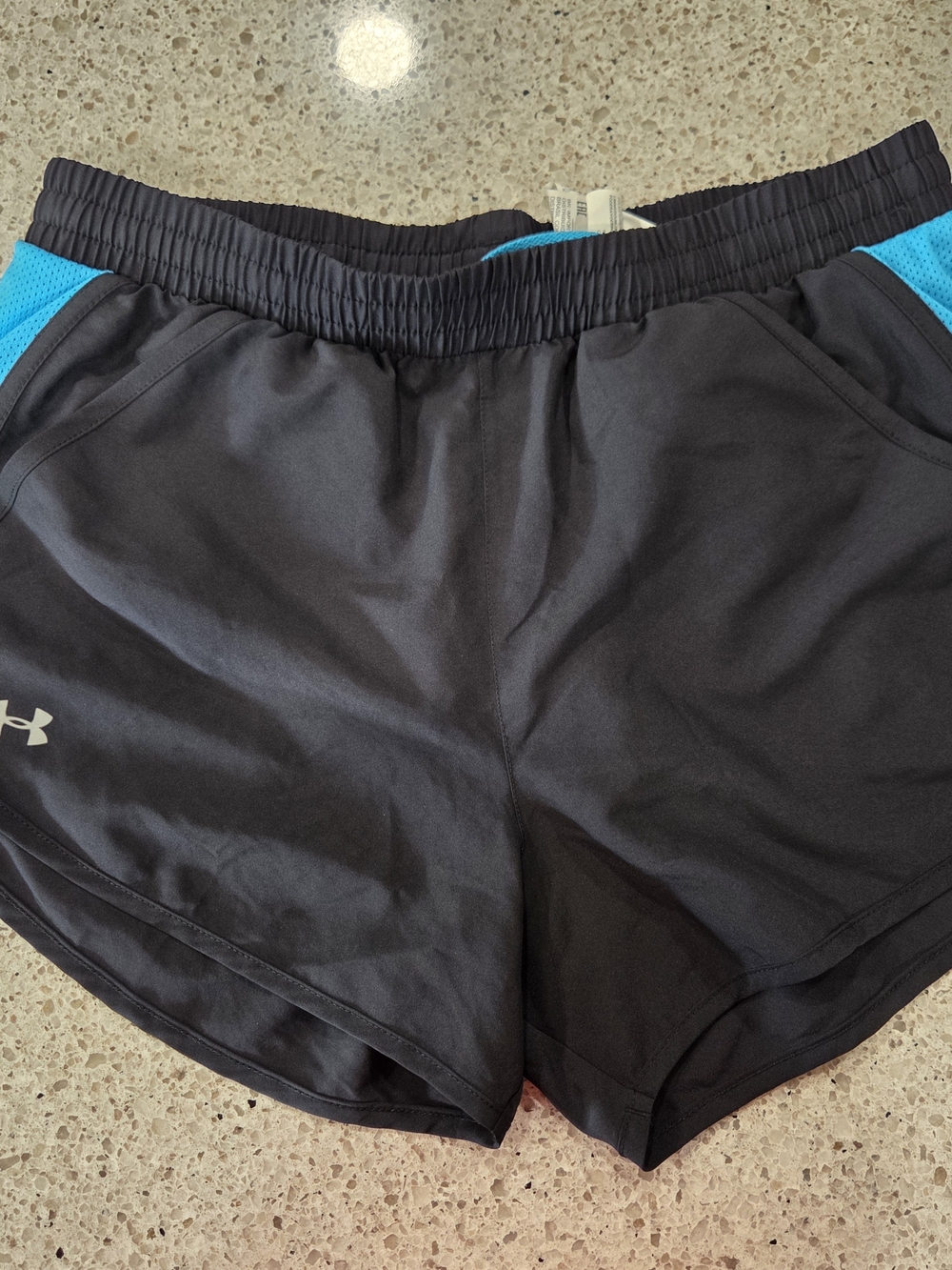 Under Armour Women’s Black Shorts with Teal Accent